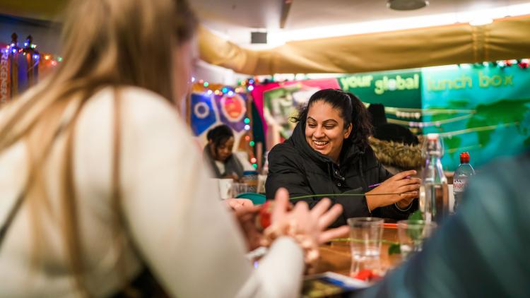 Teacher taking part in craft activity