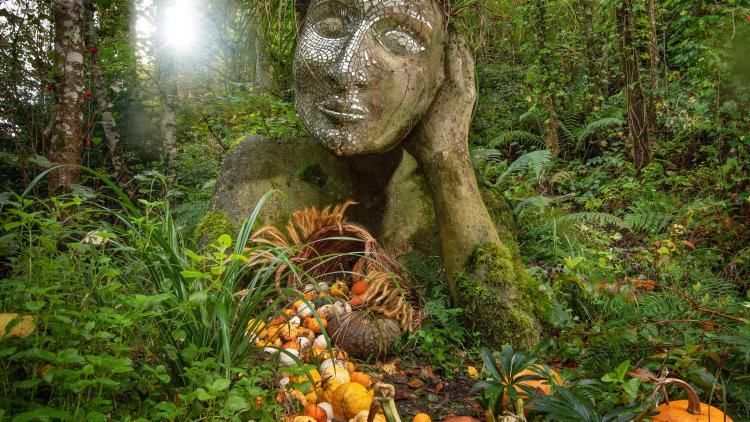 Pumpkin display around Eve sculpture