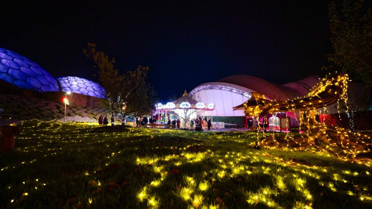 Carousel and fairy lights in the dark at the Eden Project