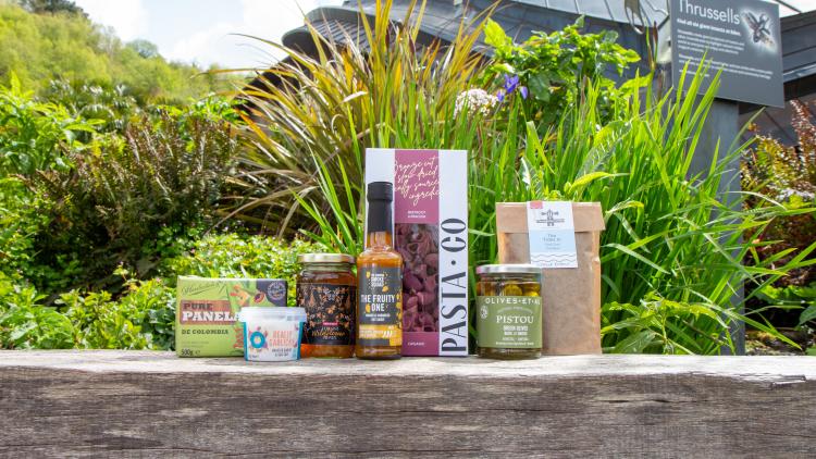 Food and drink products on a wooden ledge