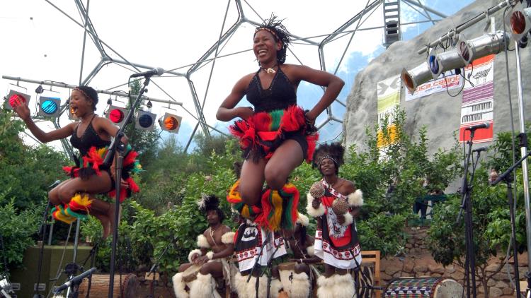 Dancers leaping up in the Mediterranean Biome