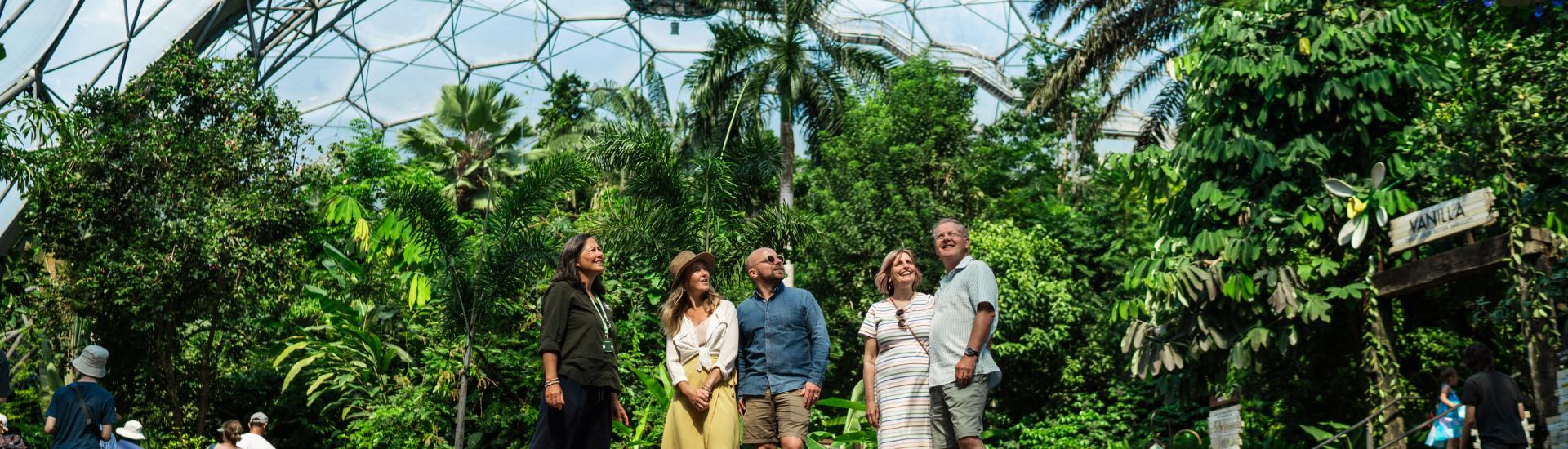 Tour guide showing visitors the Rainforest Biome