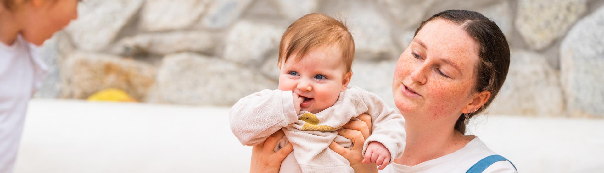 Mum and baby singing in the Med Biome.